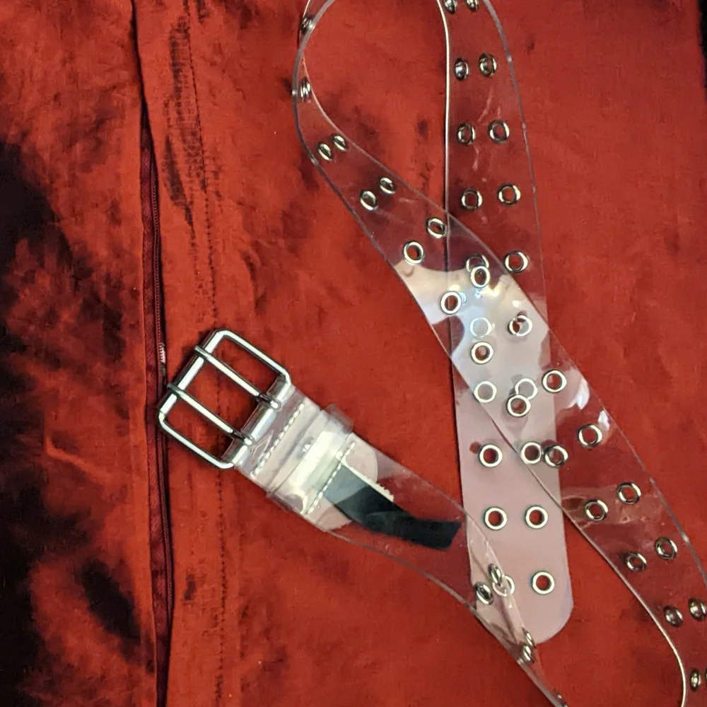 Set Of Two Clear and White Belts One With Tag Brandy Melville 36